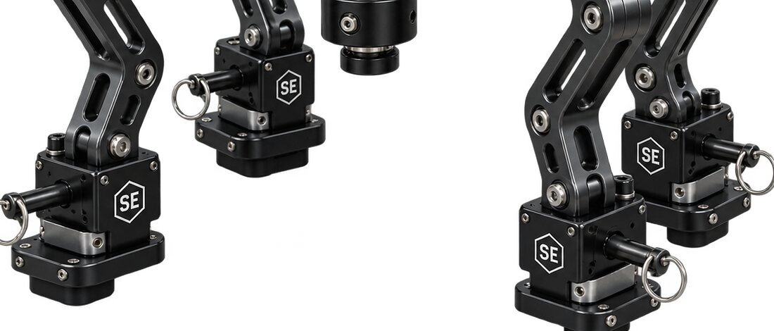 An illustration of four actuator heads on their articulated arms with their pull pins.
